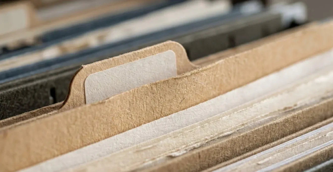 Close-up of organized filing system with folders and documents